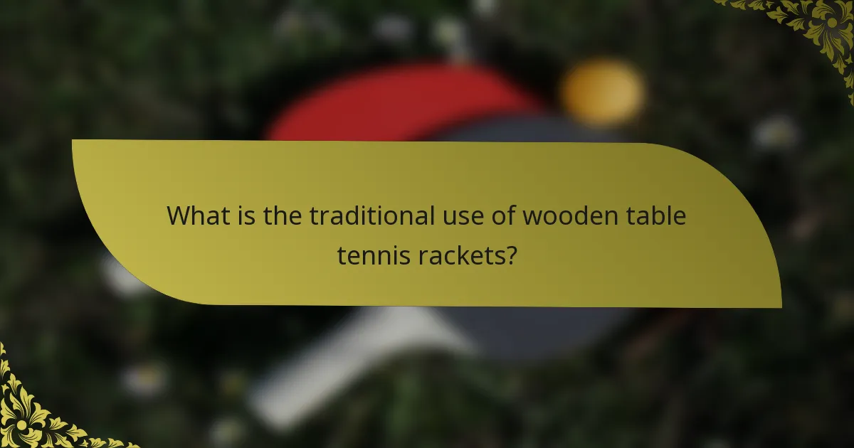 What is the traditional use of wooden table tennis rackets?